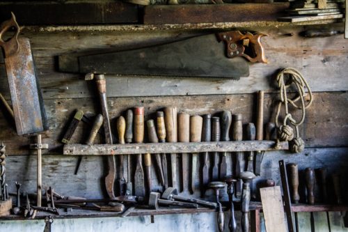 Tools hanging on wall.